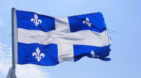 Какой цветок изображен на гербе Квебека?