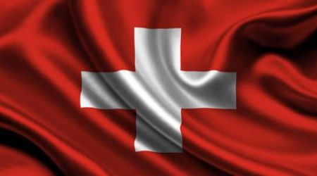 Какой язык НЕ входит в число официальных языков Швейцарии?