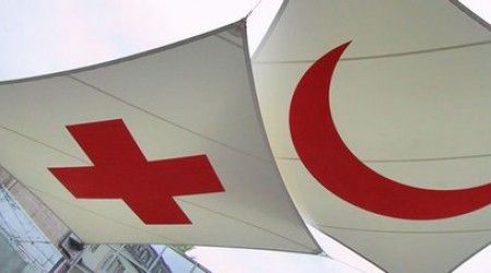 Флаг какого государства взят за основу символа "Международного Красного Креста"?